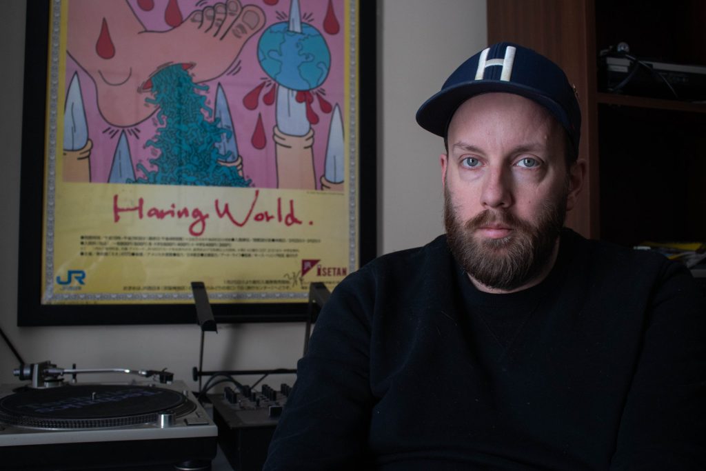 Tyler in his DJ equipment room.
