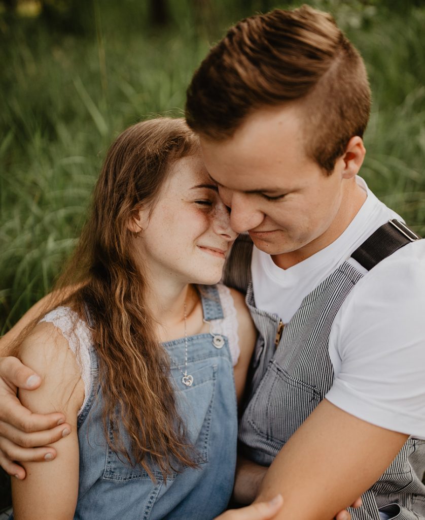 Two people holding each other