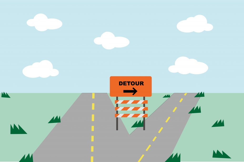 An illustration of a fork in the road with a sign saying "Detour" point to the right.