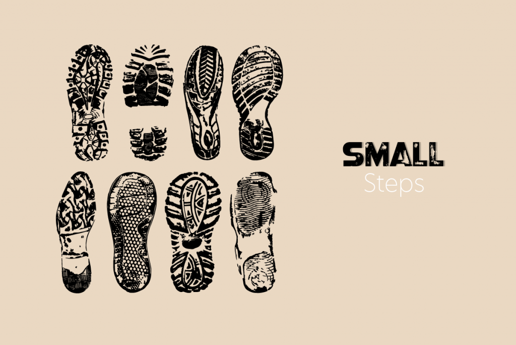 8 black shoe-prints with the caption "small steps"