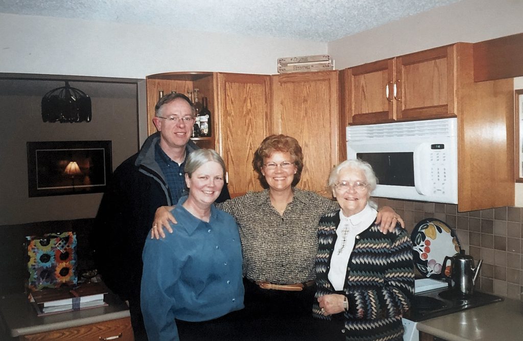 Pam reunites with her family.