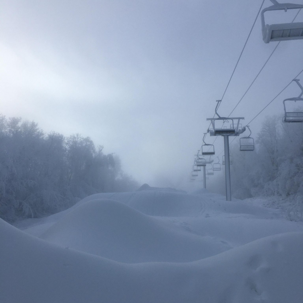 Large piles of snow cover Asessipi run