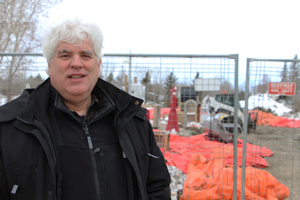 Glen McKenzie stands by the construction site of the future River Road lift station on Feb. 1.