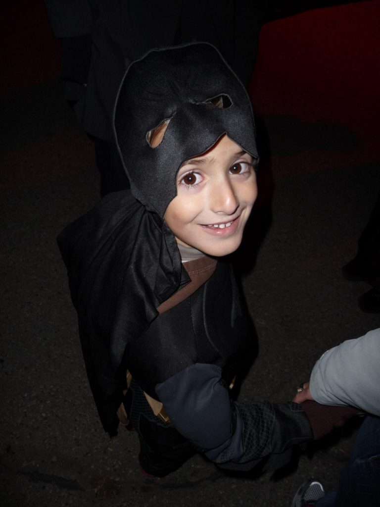 Madox in a Batman costume during Halloween.