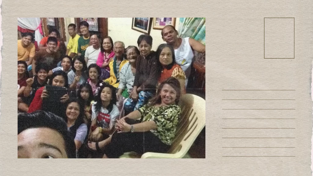 A postcard-style image with a photo of John and his relatives at his grandparents' home in Santiago City, Isabela, Philippines.