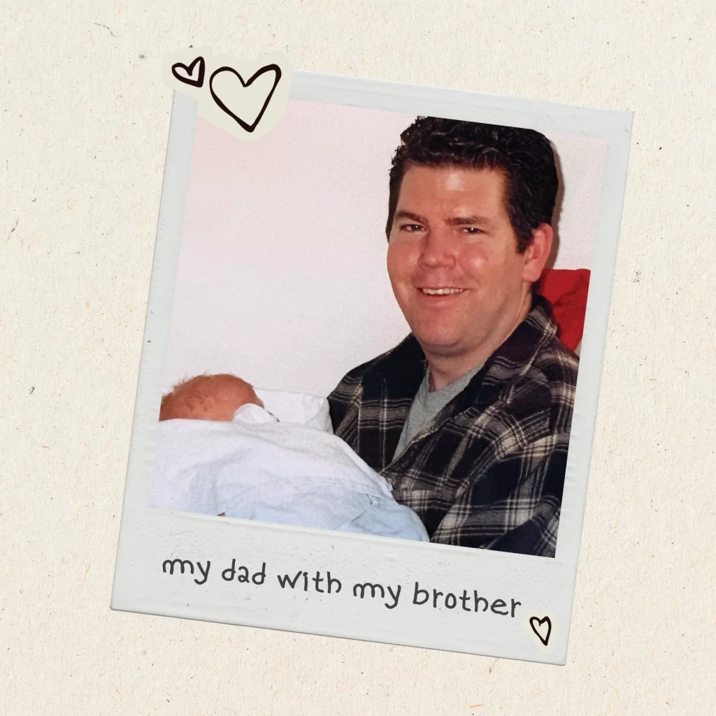 Durga holding his first child.