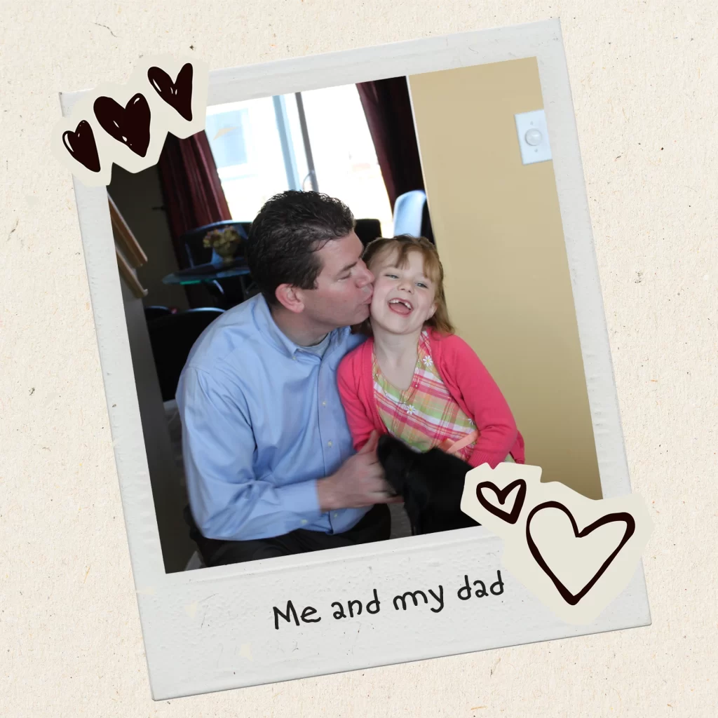 Durga kissing young Ava on the cheek.