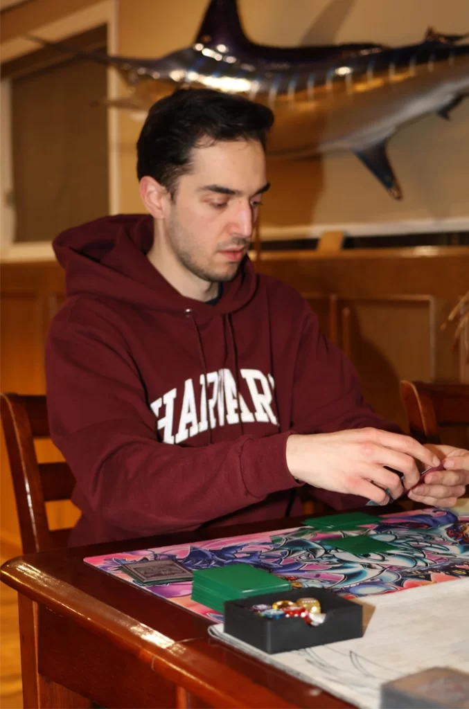 2026-ADEOCAMPO-Photo of Troy Dodson looking down at this cards.