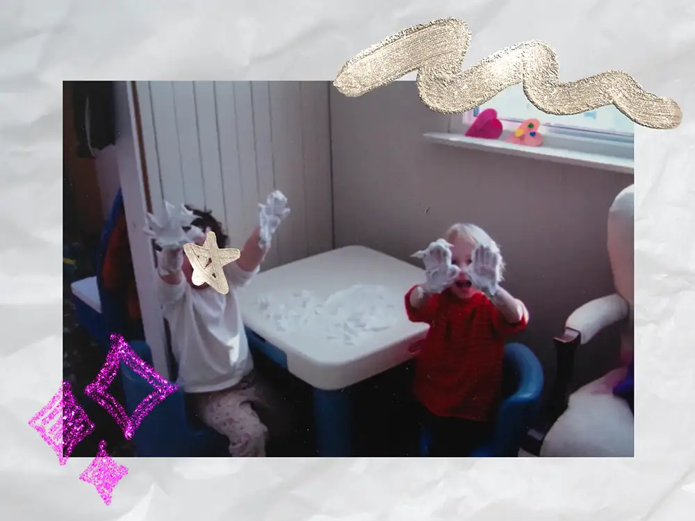 Scrapbook style page, childhood picture of me and my best friend making slime and showing our glue covered hands to the camera. 