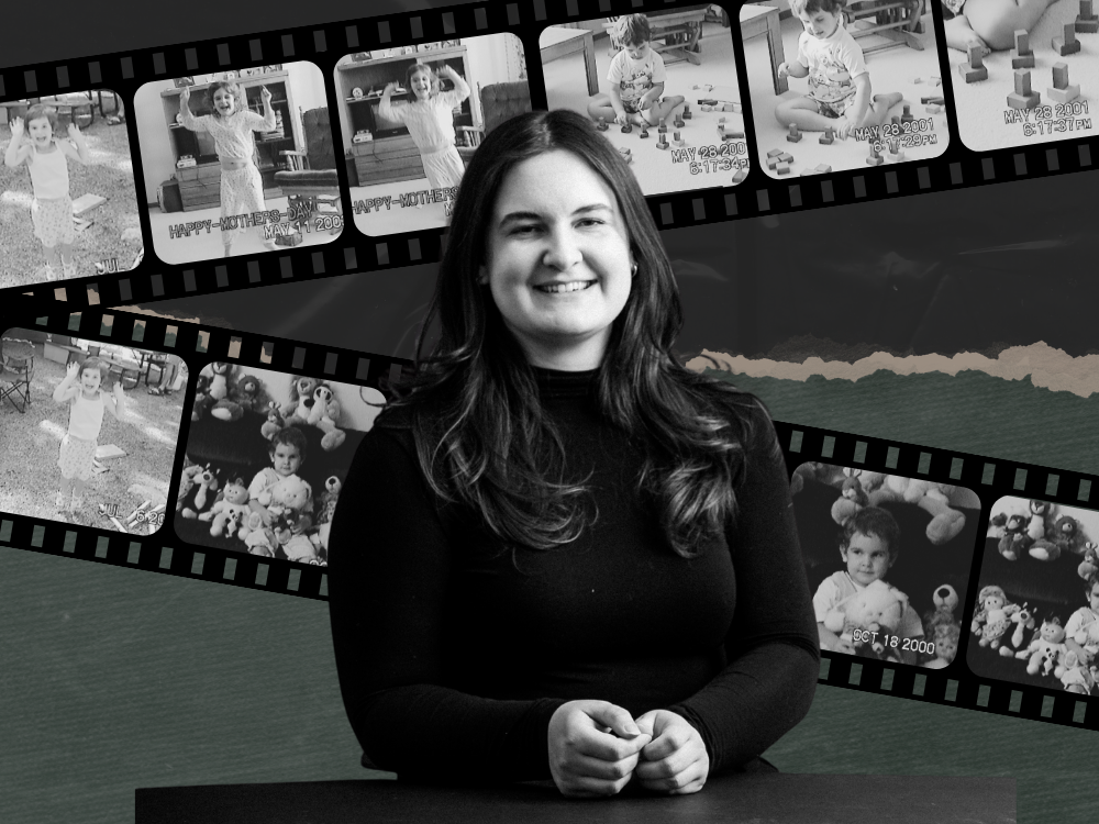 Juliana in front of film strips with black and white photos of her as a child