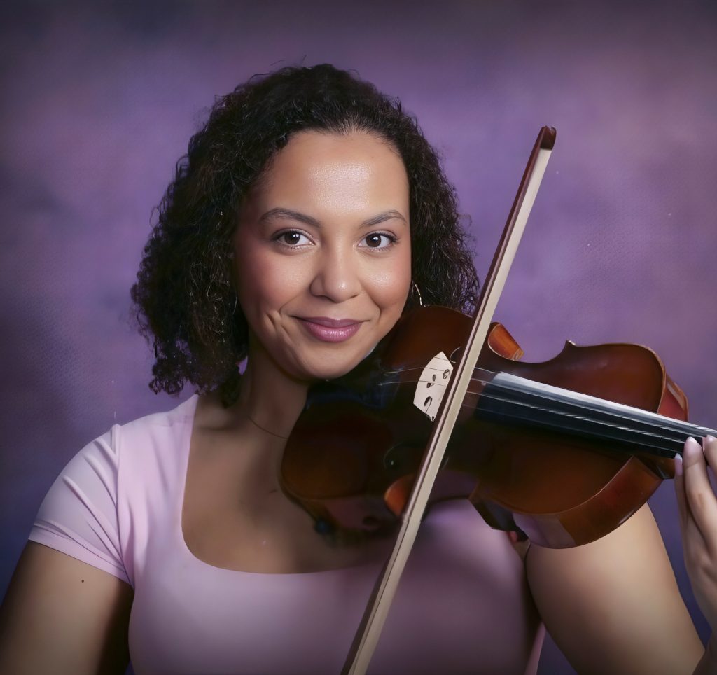 Woman holding violin.